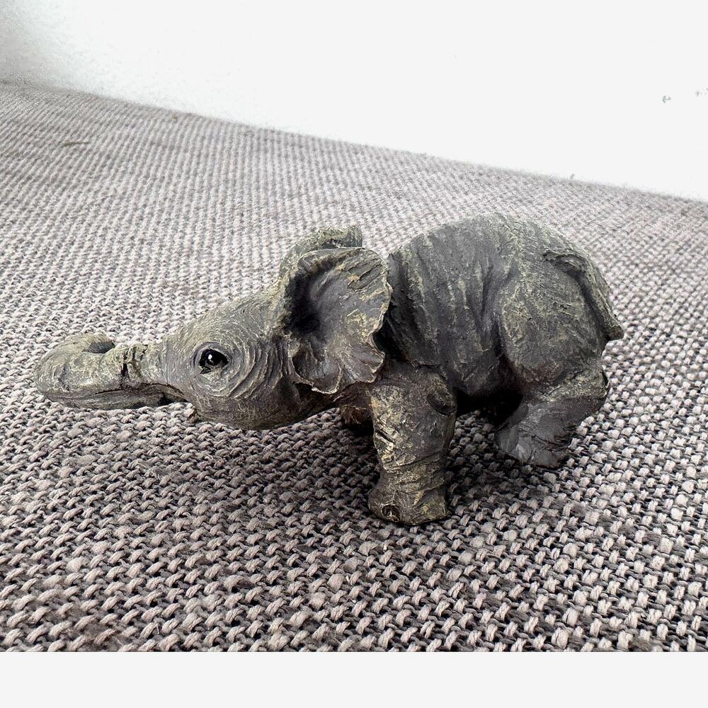 "The Herd Elephant Collection" by Martha Carey-Marty Sculptures.